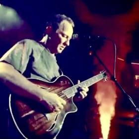 Photo of Jimmy George playing guitar