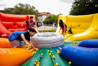 people playing on inflatables