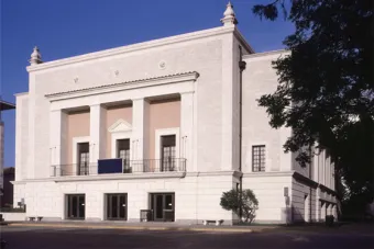 An image of the main entrance of the Hogg Memorial Auditorium