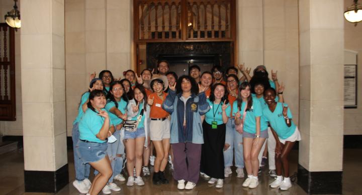 students posing with the Forty Acres Fest headliner Remi Wolf