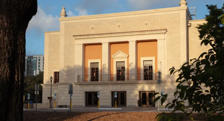 Image of the outside of Hogg Memorial Audiorium at dusk