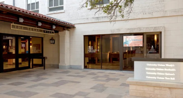 Outside the Texas Union building, the exterior entrance to the Union Underground